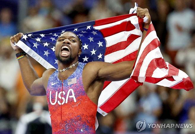 육상 남자 100ｍ 우승 후 기뻐하는 라일스  [EPA=연합뉴스 자료사진]