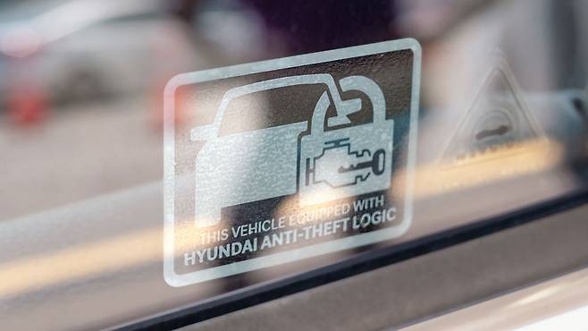 A sticker showing that the car has installed Hyundai Motor's anti-theft software upgrade (Highway Loss Data Institute)