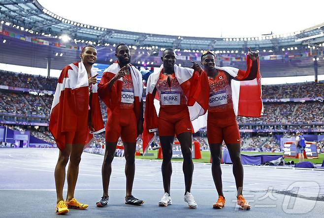 남자 계주 금메달을 합작한 캐나다. ⓒ 로이터=뉴스1