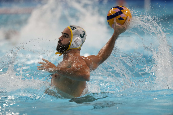 Australia's Milos Mksimovic scores a goal during a men's seventh-eighth place classification match between Australia and Italy, at the Paris Olympics on Saturday in Paris. [AP/YONHAP]