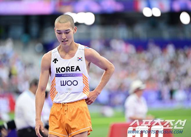 대한민국 육상 높이뛰기 대표 우상혁이 11일(한국 시간) 프랑스 파리 스타드 드 프랑스에서 열린 2024 파리올림픽 육상 남자 높이뛰기 결선에서 2m31을 실패한 뒤 아쉬워하고 있다. 파리(프랑스)=정재근 기자 cjg@sportschosun.com/2024.8.11/