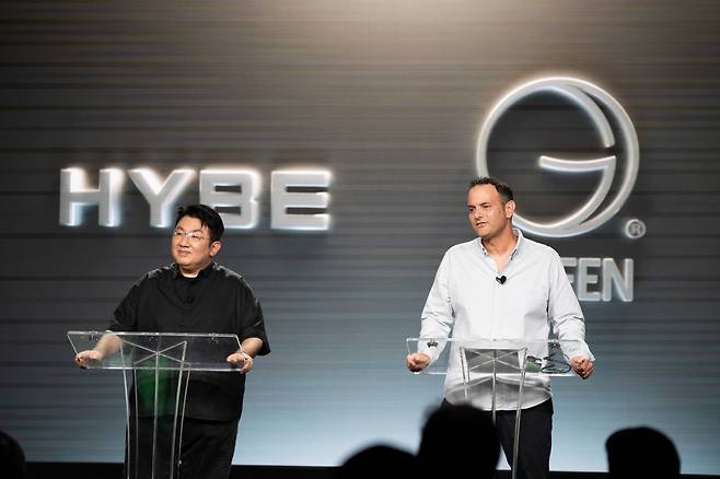 Hybe Chairman Bang Si-hyuk (left) and Interscope Geffen A&M Records CEO John Janick participate in a press conference for "The Debut: Dream Academy" at IGA Studios in Santa Monica, California, Aug. 29, 2023. (Hybe)