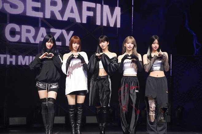 Le Sserafim poses during a media showcase for their 4th mini-album "Crazy" held in Seoul, on Thursday. (Source Music)