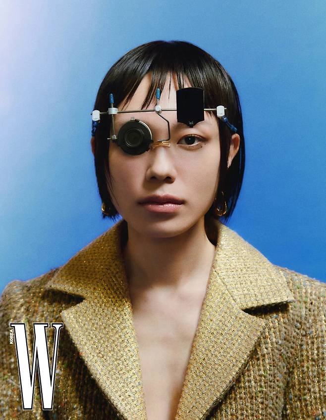 Kim Ye-ji poses for a photo wearing Louis Vuitton (W Korea)