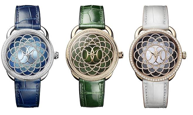 자개·깃털·밀짚·나무 등 자연의 소재는 물론 대리석· 옵시디언(흑요석)·헤머타이트(적철석) 등 컬러 스톤을 사용해 다이얼을 완성하는 아쏘 아쉬데코 워치.[사진 에르메스]