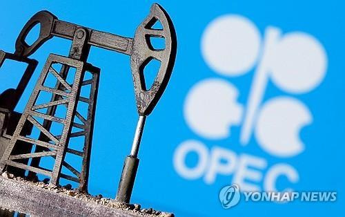 원유 시추기 모형과 OPEC 로고 [로이터 연합뉴스 자료사진. 재판매 및 DB 금지]