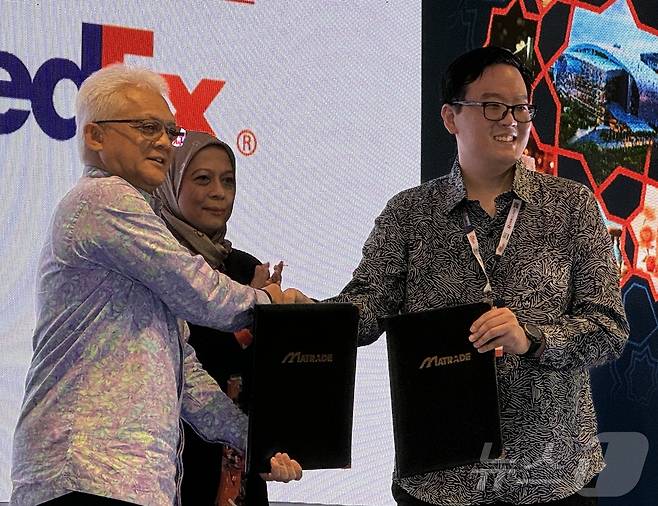 MATRADE 무스타파 CEO와 페덱스 말레이시아 티엔 롱 우온 이사