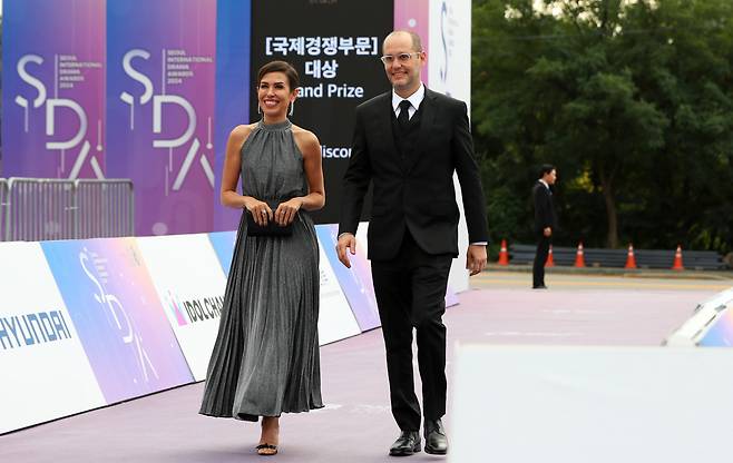 Luciana Monteiro (left), executive producer of "Justice: Misconduct" and Pedro Peregrino, director of the same series, are seen attending the 2024 Seoul International Drama Awards held in Yeouido, Seoul, on Wednesday. (Newsis)