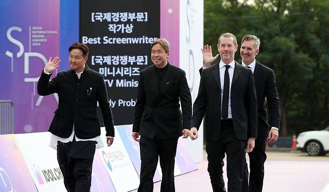 From left: Director of "3 Body Problem" Derek Tsang and the show's showrunners Alexander Woo, D.B. Weiss and David Benioff are seen attending the 2024 Seoul International Drama Awards held in Yeouido, Seoul, on Wednesday. (Newsis)