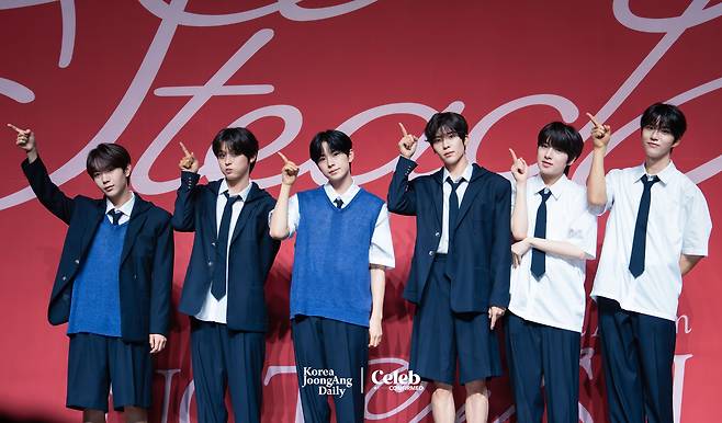 Boy band NCT Wish poses for the cameras during a press showcase held on Tuesday at the Blue Square in central Seoul. [DANIELA GONZALEZ PEREZ]