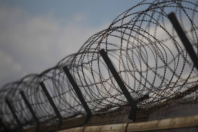 A barbed wire fence at a military check point connecting South and North Korea at the Unification Bridge in Paju, Gyeonggi Province in South Korea. (GettyImages)