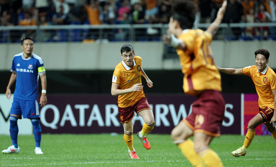 Gwangju FC midfielder Jasir Asani, center, celebrates scoring a goal during a 2024-25 AFC Champions League Elite league stage match against the Yokohama F. Marinos at Gwangju World Cup Stadium in Gwangju on Tuesday. [YONHAP]