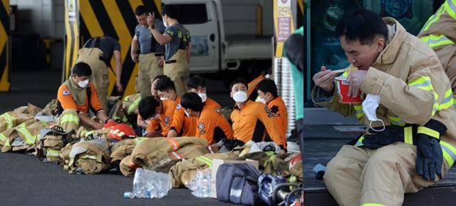 밤샘 화재 진압이 이루어지는 대형 화재 사고나 며칠씩 교대 근무를 해야 하는 산불 진화에 투입된 소방관들은 현장 바닥에 앉아 잠시 쉬거나 쪽잠을 잔다. 컵라면으로 끼니를 때우는 것도 부지기수다. 사진은 화재 진압에 투입된 소방관들이 현장 바닥에 앉아 쉬고 컵라면으로 열량을 보충하는 모습. 한국일보 자료사진