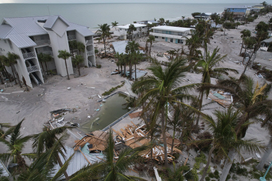 Debris lies scattered on Manasota Key, Fla., following the passage of Hurricane Milton, Friday, Oct. 11, 2024. (AP Photo/Rebecca Blackwell)