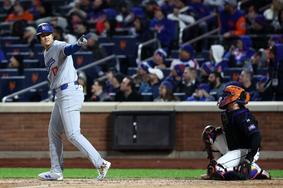 BASEBALL-MLB-NYM-LAD/ - Oct 16, 2024; New York City, New York, USA; Los Angeles Dodgers two-way player Shohei Ohtani (17) reacts after hitting a three run home run against the New York Mets in the eighth inning during game three of the NLCS for the 2024 MLB playoffs at Citi Field. Mandatory Credit: Wendell Cruz-Imagn Images    <Copyright (c) Yonhap News Agency prohibits its content from being redistributed or reprinted without consent, and forbids the content from being learned and used by artificial intelligence systems.>