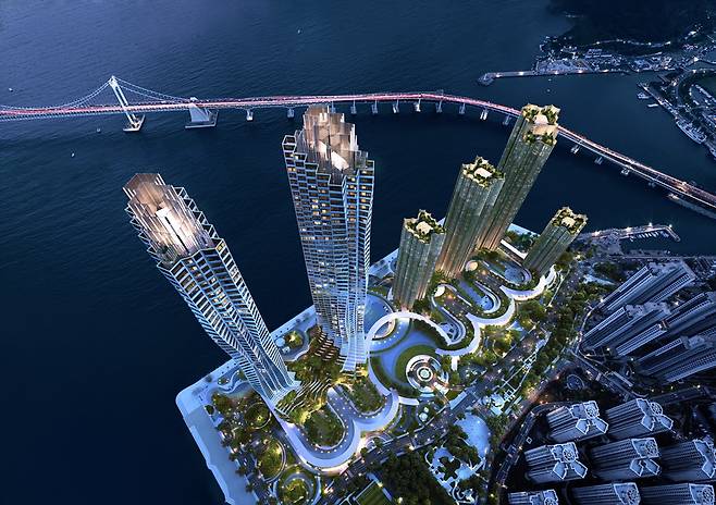 부산 수영구 남천동에서 재건축이 추진 중인 ‘삼익비치 아파트’의 조감도. 부산 광안대교 바로 앞에 지어질 이 아파트는 최고 99층 높이로 재탄생할 예정이다. 건축 디자인은 프랑스 국립 도서관 등을 설계한 프랑스 건축가 도미니크 페로가 맡았다. /부산시