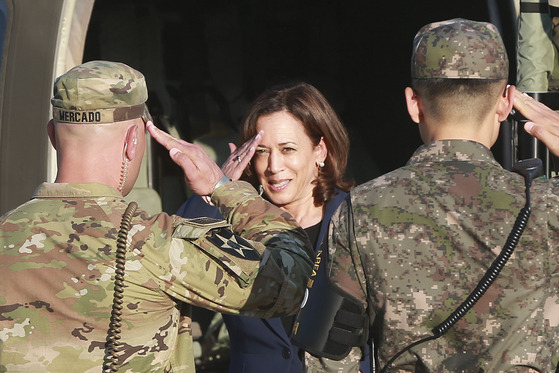 U.S. Vice President Kamala Harris, center, salutes a U.S. Army officer and South Korean interpreting officer as she wraps up her visit to Panmunjom inside the demilitarized zone on Sept. 29, 2022. [JOINT PRESS CORPS]