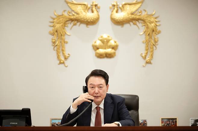 President Yoon Suk Yeol speaks during his phone call with European Commission President Ursula von der Leyen at the presidential office in Seoul on Monday, in this photo provided by his office. (Yonhap)