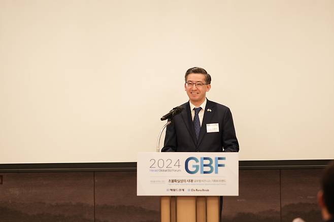 Ambassador Alisher Abdusalomov delivers his welcoming address at the Global Business Forum held in Seoul on Wednesday. (The Korea Herald)