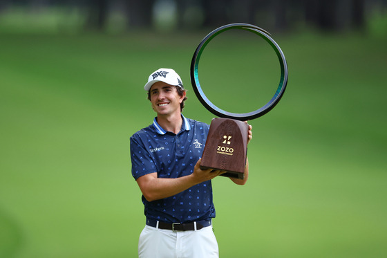 Nico Echavarria poses with the trophy after the award ceremony following the final round of the Zozo Championship 2024 at Accordia Golf Narashino Country Club on Sunday in Inzai, Chiba, Japan. [GETTY IMAGES]