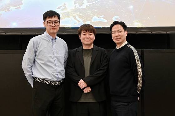 From left: Hwang Jae-heon, head of the intellectual property business center at Kakao Entertainment, Koji Ishii, head of content business strategy department of Fuji TV and Playlist CEO Park Tae-won. [KAKAO ENTERTAINMENT]