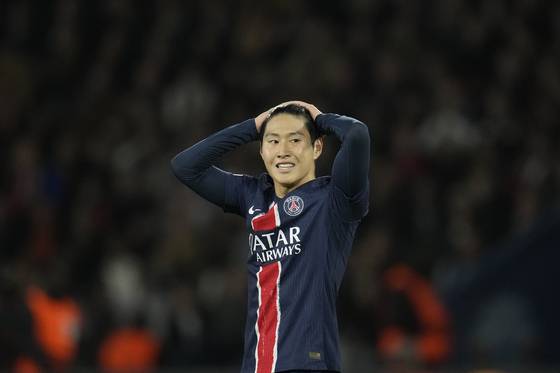 Paris Saint-Germain midfielder Lee Kang-in reacts during the Champions League match against PSV Eindhoven at the Parc des Princes stadium in Paris on Oct. 22. [AP/YONHAP]
