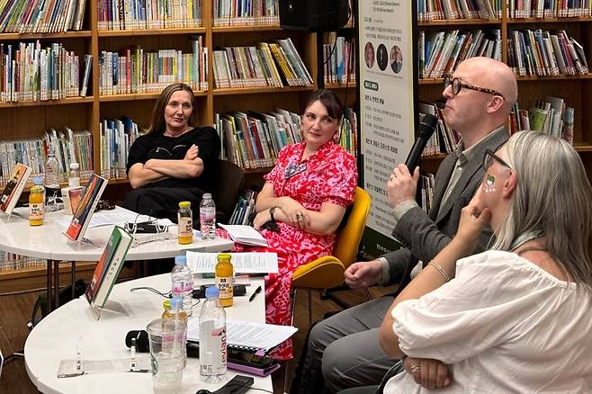 From left, Irish writers Anne Griffin, Sinead Gleeson and Ronan Hession and Michelle Winthrop, Irish Ambassador to Korea, attend a book talk at the Seoul Metropolitan Library, held as part of the Ireland Literature Festival Korea 2024. (Seoul Metropolitan Library)