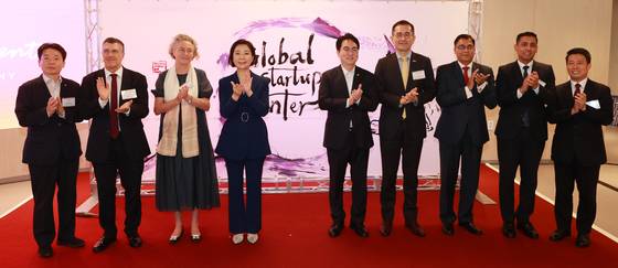 This file photo provided by the Ministry of SMEs and Startups shows SMEs Minister Oh Young-ju (4th from L) at the opening ceremony for the Global Startup Center in southern Seoul on July 31, 2024. (PHOTO NOT FOR SAL [YONHAP]