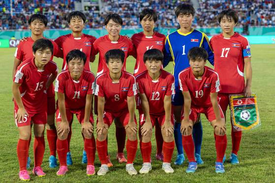 North Korea pose for a team photo ahead of the FIFA U-17 Women's World Cup 2024 final against Spain at the Olimpico Felix Sanchez Stadium in the Dominican Republic on Sunday. [AFP/YONHAP]