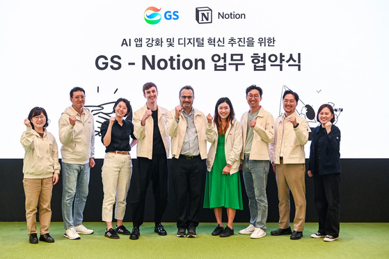 GS Group and Notion executives pose for a photo at the signing ceremony for a memorandum of understanding regarding AI at the GS Tower in Gangnam District, southern Seoul, on Monday. [GS]