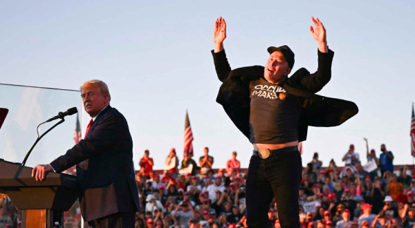 Elon Musk, Tesla CEO, enthusiastically dancing at a Trump rally to show support during the presidential campaign. (AFP/Yonhap)