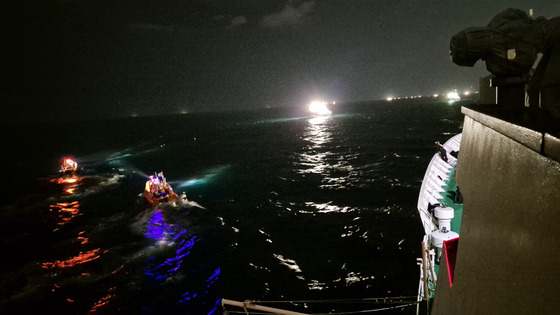 The Korea Coast Guard conducts a search and rescue mission in waters approximately 24 kilometers (15 miles) northwest of Biyang Island, under the jurisdiction of Jeju Island, on Friday morning. [KOREA COAST GUARD]