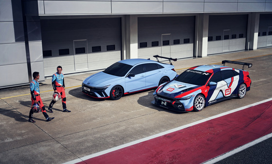 Hyundai Motor has unveiled its Avante N TCR Edition designed specifically for track erformance, shown with the Touring Car Racing (TCR) car on the right. [HYUNDAI MOTOR]