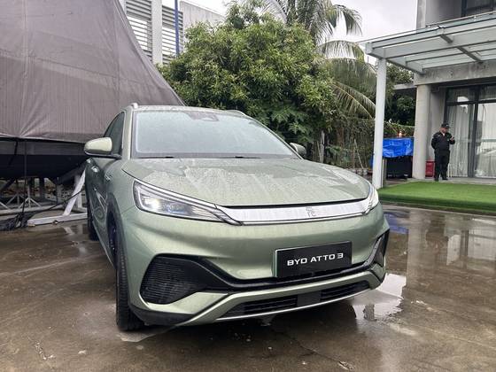 BYD's Atto 3 compact SUV is parked for display in a yachting center near the company's headquarters in Shenzhen, China. [SARAH CHEA]