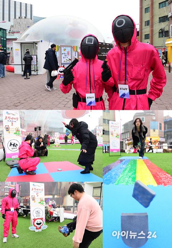 26일 오후 서울 마포구 홍대 레드로드 R1존 에어돔에서 '홍대 에어돔 K-유니버스 페스티벌'이 진행된 가운데 참가자들이 오징어게임 체험을 하고 있다. [사진=정소희 기자]