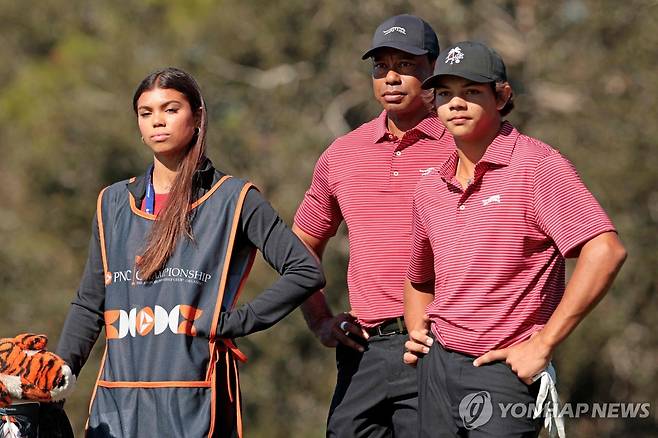 2024년 12월 PNC 챔피언십의 샘, 우즈, 찰리(왼쪽부터) [AFP=연합뉴스]
