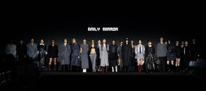 Models wear outfits from Daily Mirror's collection at 2025 fall-winter Seoul Fashion Week at Dongdaemun Design Plaza in Seoul on Feb. 7. (The Opening)