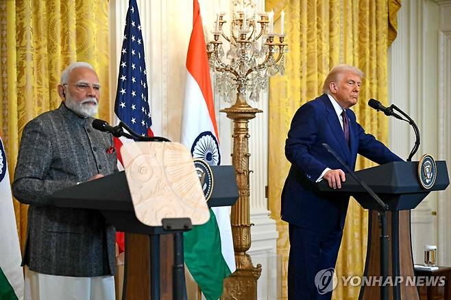 트럼프 미국 대통령(오른쪽)과 모디 인도 총리 [AFP=연합뉴스. 재판매 및 DB 금지]