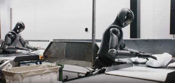 피규어02 모델이 컨베이어 벨트에서 배송품을 분류하고 있다. [사진=피규어AI]