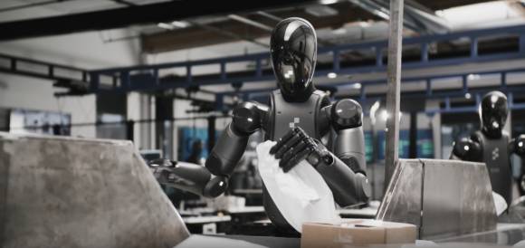 피규어02 모델이 컨베이어 벨트에서 배송품을 분류하고 있다. [사진=피규어AI]