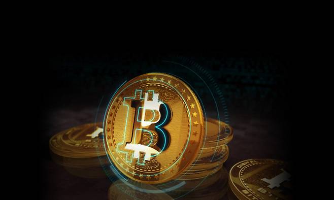 2011년 1개당 1달러였던 비트코인 가격은 지난해 처음 10만 달러를 돌파했다. [Gettyimage]