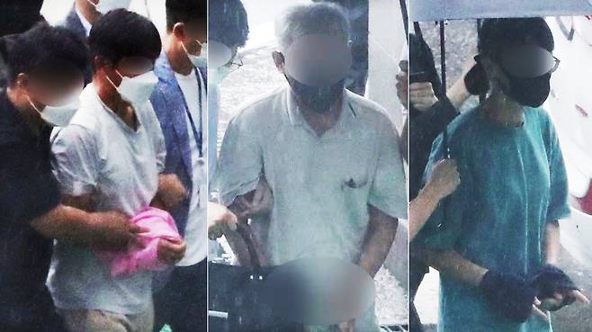 충북동지회 조직원들이 지난 2021년 8월 영장실질심사를 위해 청주지법에 들어서고 있는 모습. /뉴스1