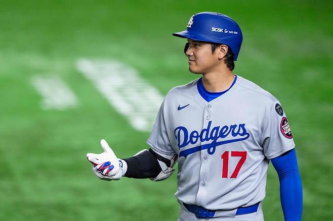 LA 다저스 오타니 쇼헤이가 18일 일본 도쿄돔에서 열린 시카고 컵스와 2025 시즌 개막전에서 웃고 있다. AFP연합뉴스