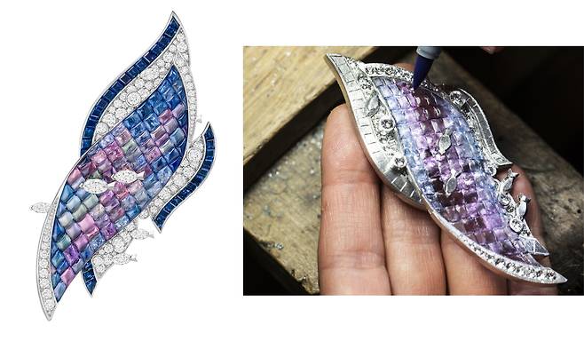 보랏빛과 푸른빛이 도는 여러 가지 색의 버프 톱 사파이어를 비트라이 미스터리 세팅한 프와송 미스터리유 클립. 넘실대는 파도와 물고기를 표현했다. 사진 반클리프 아펠