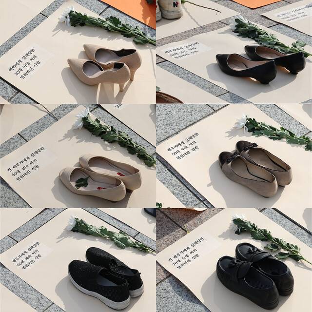 한국여성의전화가 지난해 11월25일 오후 서울 종로구 보신각 앞에서 세계여성폭력추방주간을 맞아 여성 살해 규탄하는 ‘192 켤레의 멈춘 신발’ 행위극을 진행했다. 신발이 놓인 종이 위에는 2023년 한 해 동안 목숨을 잃은 피해자들의 이야기가 담겨 있다. 이름은 가명이다. 백소아 기자