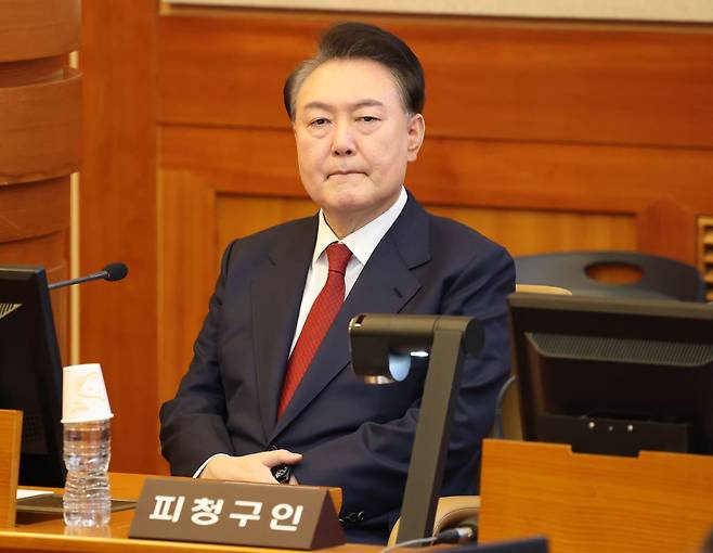 윤석열 전 대통령이 지난 4일 헌법재판소가 대통령 탄핵을 만장일치로 인용하면서 파면됐다. 사진은 윤 전 대통령이 지난 2월 13일 헌법재판소 변론기일에 자리한 모습. /뉴스1