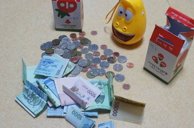 김정규씨 가족의 기부금. 전북사회복지공동모금회 제공
