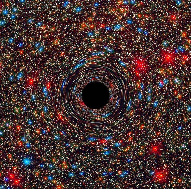 은하 한가운데 놓여 빛을 흡수하고 있는 초거대 블랙홀의 모습. (사진=NASA) *재판매 및 DB 금지
