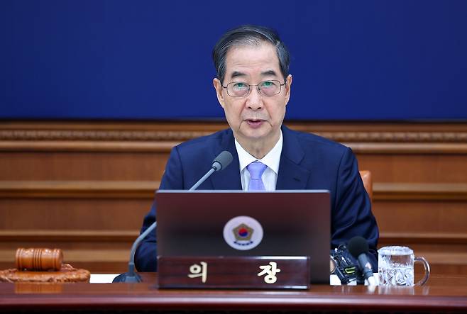 Acting President and Prime Minister Han Duck-soo speaks during a Cabinet meeting at the Government Complex Seoul on Tuesday. (Pool photo via Yonhap)