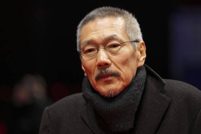 홍상수 감독이 지난 2월 제75회 베를린 국제영화제에서 영화 ‘그 자연이 네게 뭐하고 하니' 레드 카펫 행사에 참석해 포토 타임을 갖고 있다. AP뉴시스